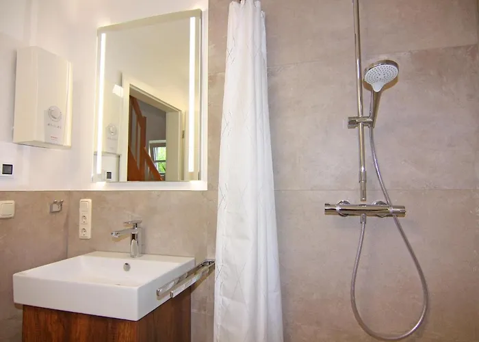 Doppelhaushaelfte Duenenhaus I, Hébergement de vacances *